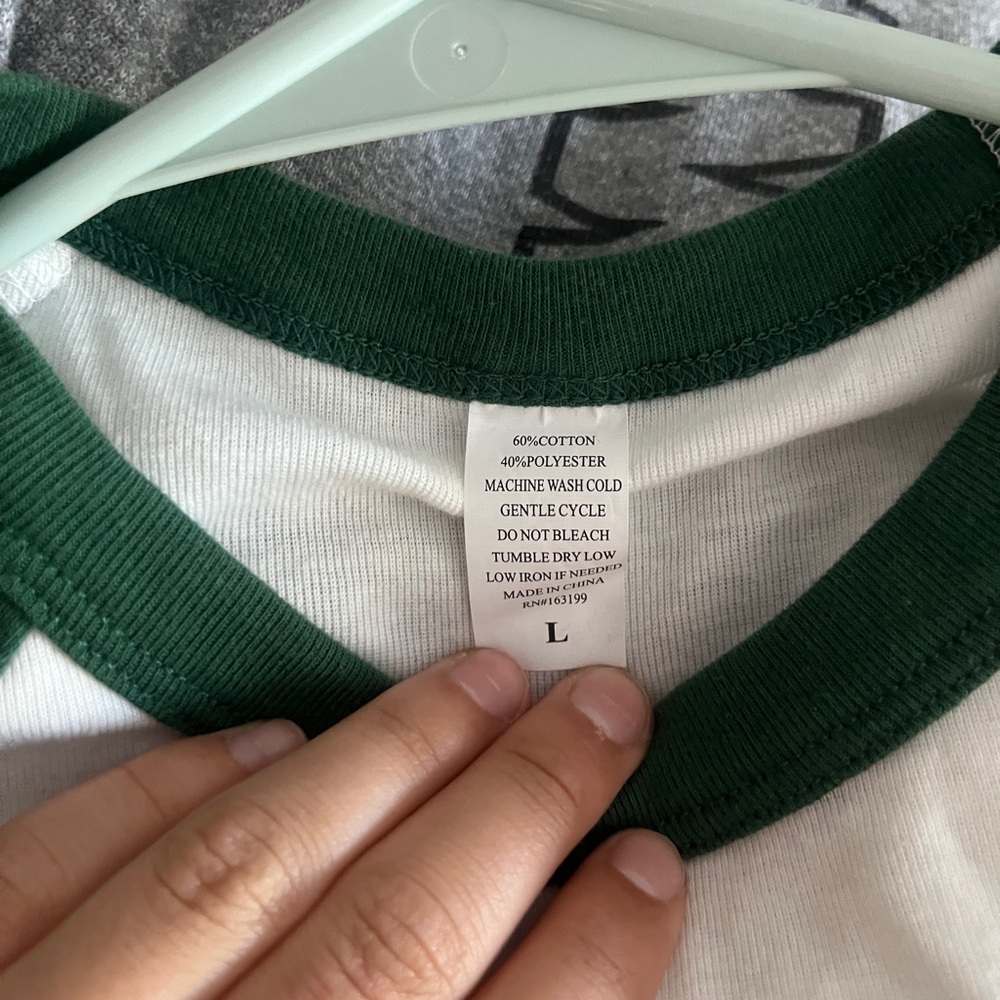 I am selling a very cute green sleeved shirt!. The material is very good!!